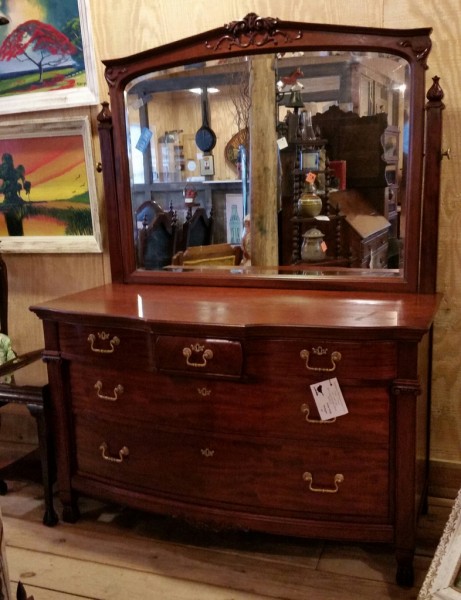 Impressive mahogany Bow Front 3 over 2 Chest With claw feet and large beveled mirror.