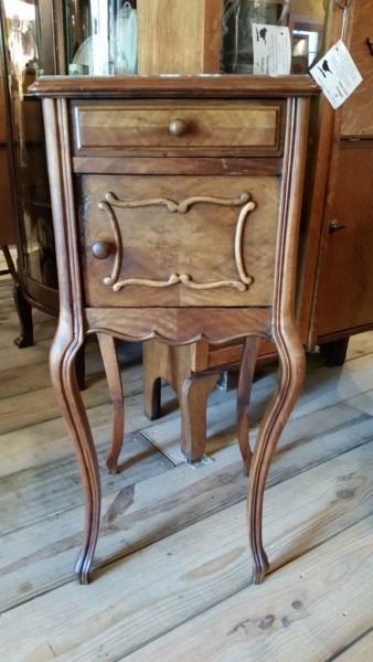A charming French 19th century bedside cabinet made from Walnut standing on carved cabriole legs. the cabinet has a lined marble cupboard with a small drawer over. the top of the cupboard has a moulded edge and a beautifully figured chocolate brown marble which complements the quarter veneer on the front and sides of the piece